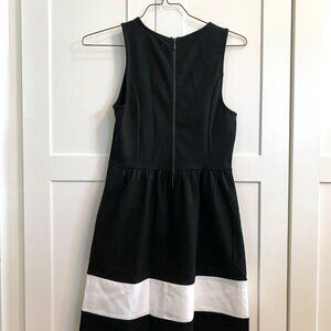 Sleeveless Black Dress with White Stripe